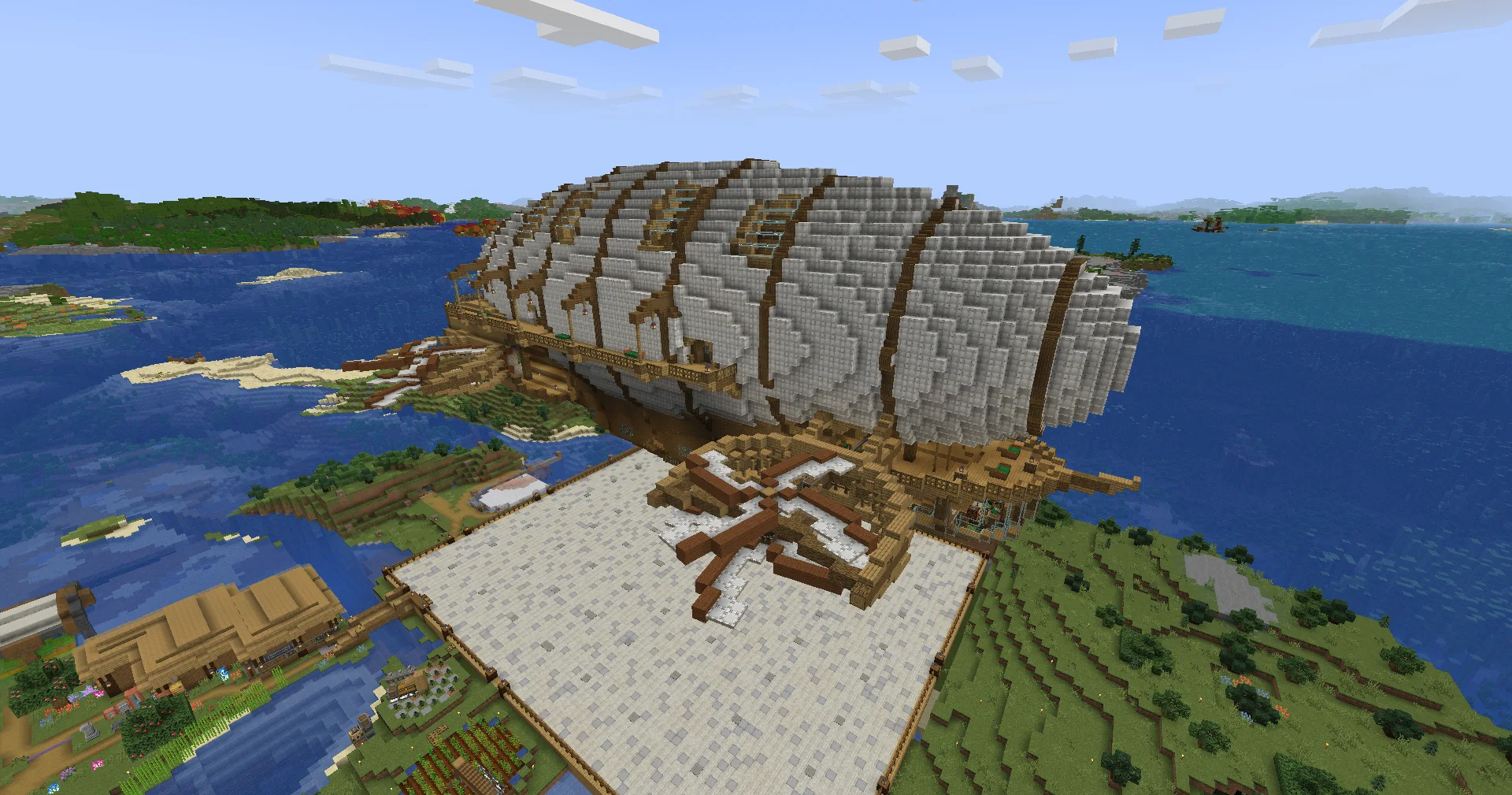 Aero Base Blimp (Updated) with Oak Planks, White Envelope, Oak Log, Oak Slab, Oak Stairs, White Wool, Framed Glass, and White Symmetric Sail, visible proportions, and a 67 x 41 x 102 schematic footprint.