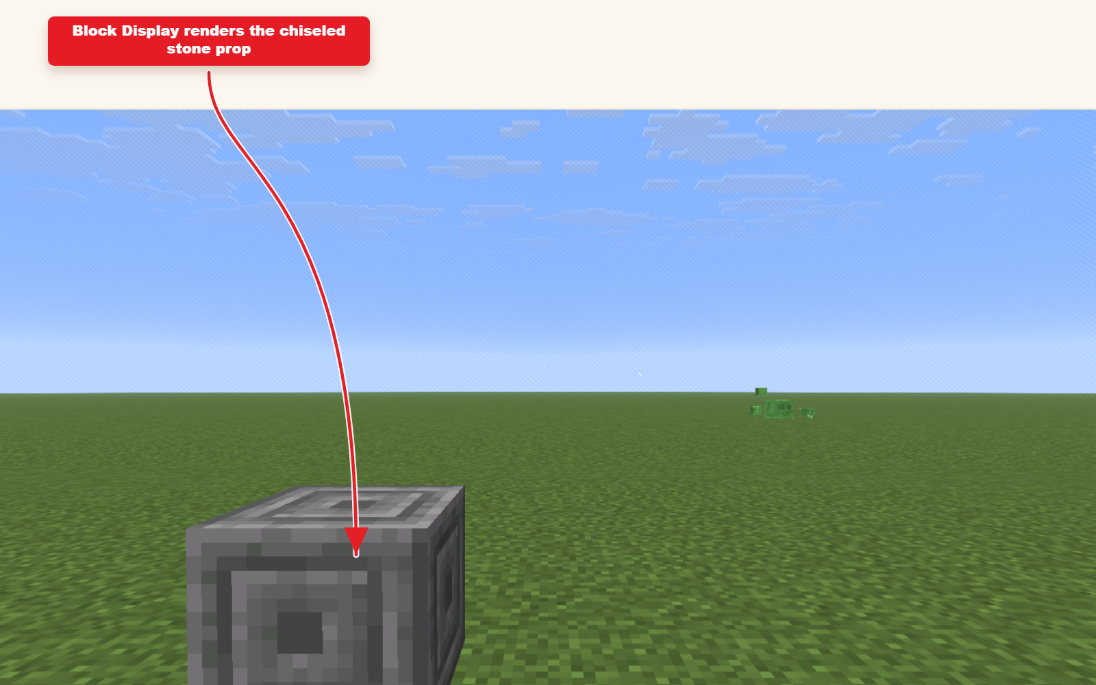 Capture d'écran du jeu montrant la décoration en pierre ciselée block_display générée par la commande prédéfinie.