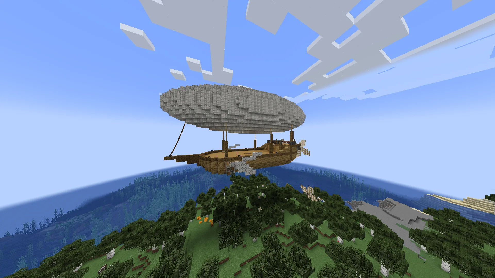 Cargo airship (working, empty) with White Envelope, Oak Planks, Oak Slab, Oak Wood, Iron Block, White Sail, Andesite Encased Shaft, and White Symmetric Sail, visible proportions, and a 33 x 38 x 67 schematic footprint.