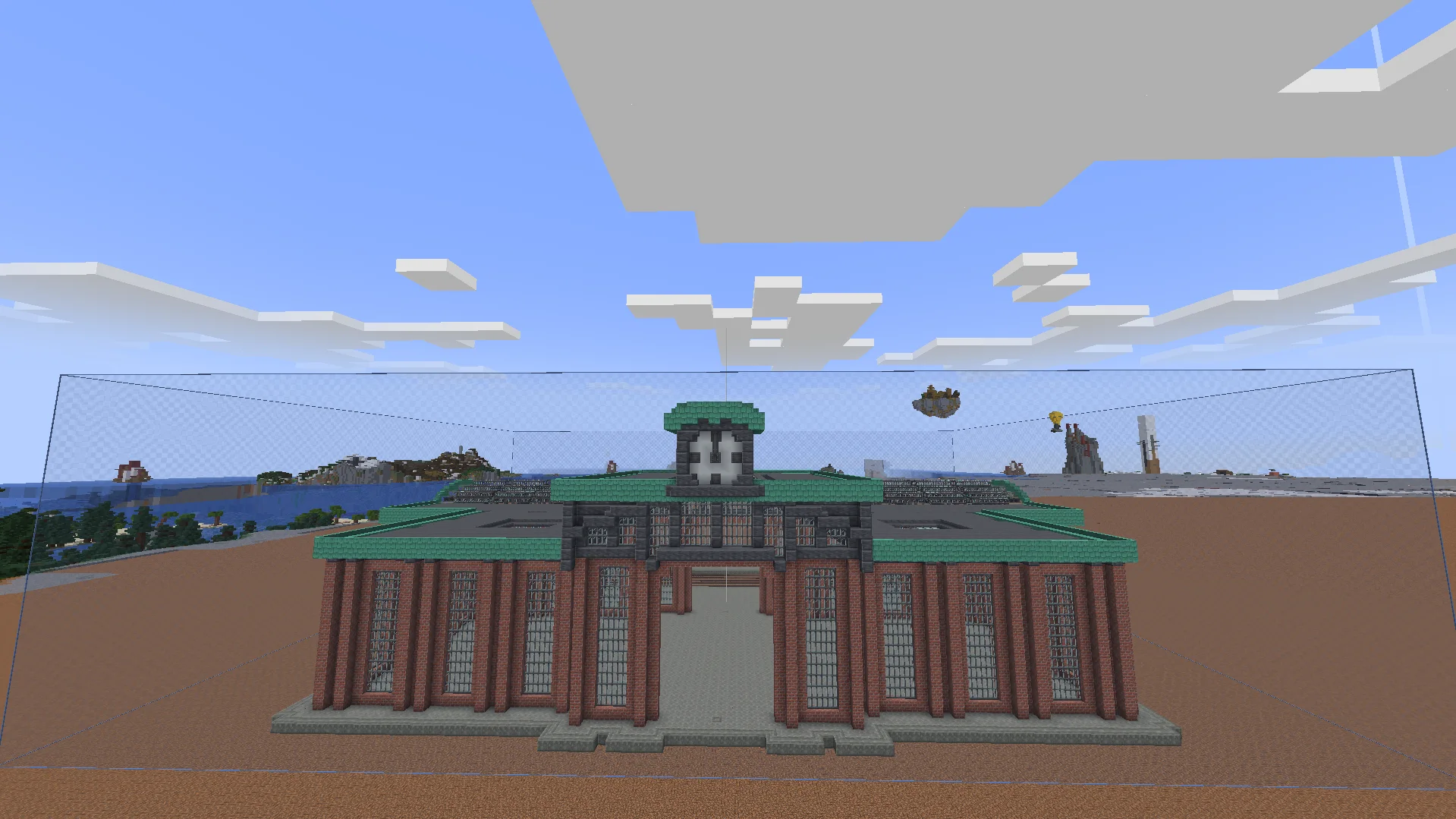 Large train station with a long roof, brick and tuff structure, industrial iron windows, metal girders, and copper roof details.